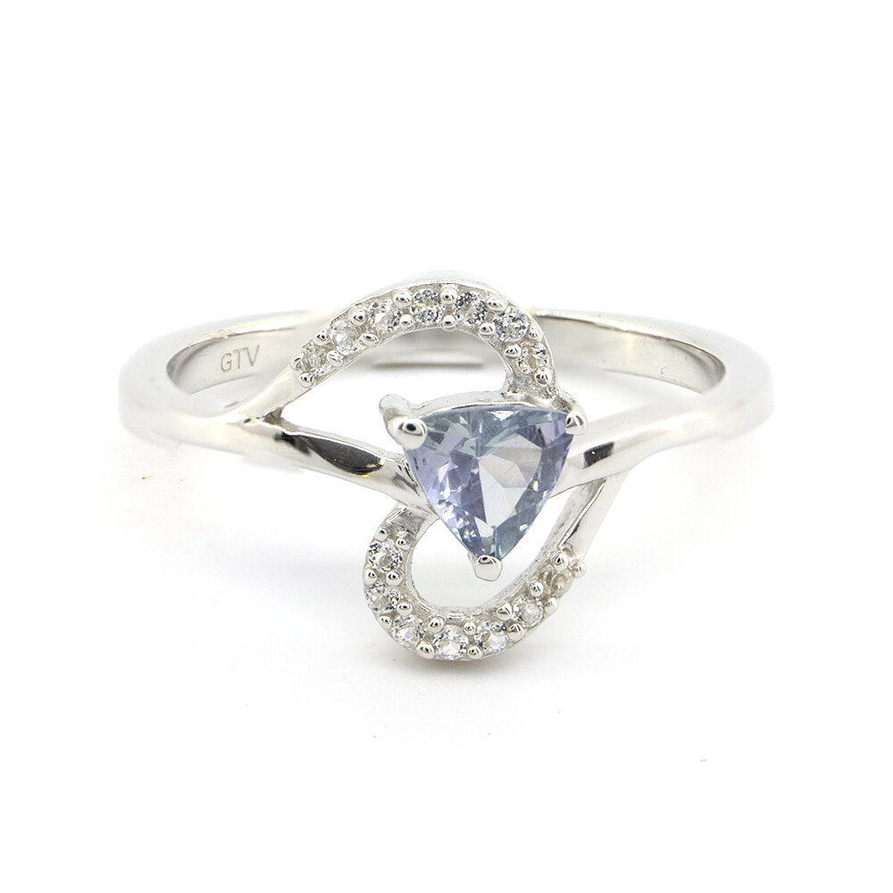 Срібна каблучка 925 проби 2,25 г з танзанітом Ман'яра класу АААА та білими топазами з США 0,6 карат Срібна каблучка 925 проби 2,25 г з танзанітом Ман'яра класу АААА та білими топазами з США 0,6 карат