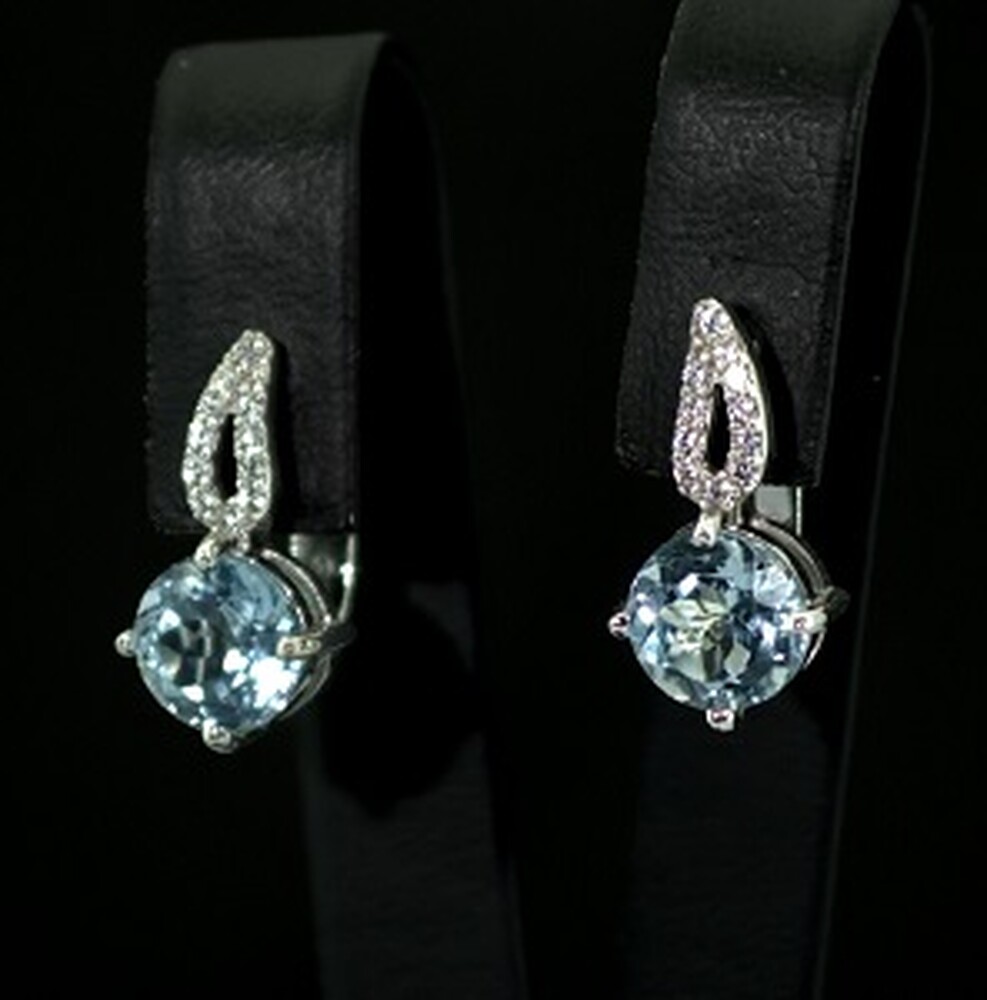 Серебряные серьги 925 пробы 4,53 г с голубыми Топазами и фианитами 4,8 карат Серебряные серьги 925 пробы 4,53 г с голубыми Топазами и фианитами 4,8 карат