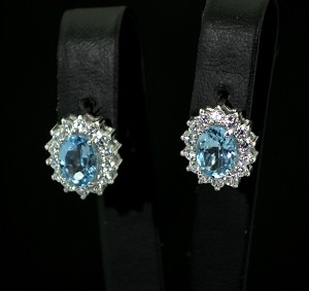 Срібні сережки 925 проби 4,94  г з блакитними Топазами та фіанітами 4,64  карат Срібні сережки 925 проби 4,94  г з блакитними Топазами та фіанітами 4,64  карат