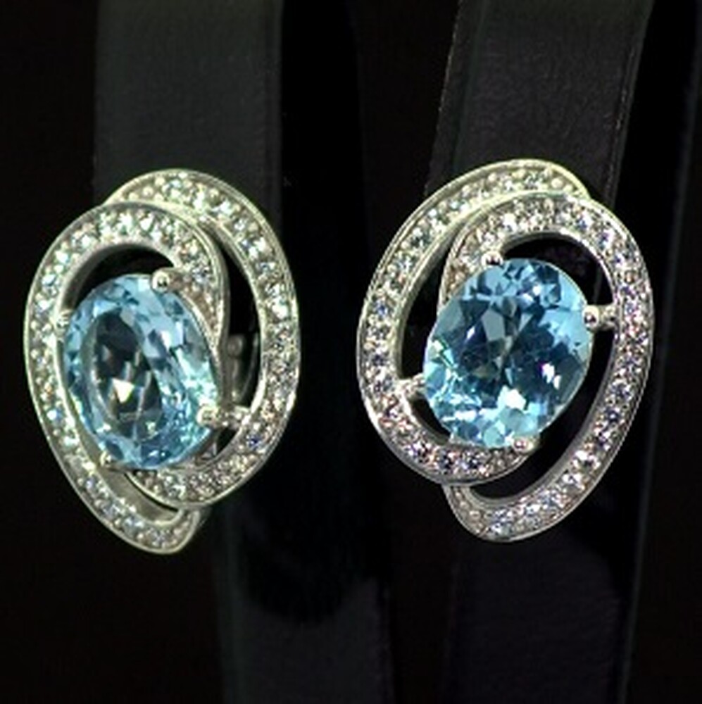 Серебряные серьги 925 пробы 6,75 г с голубыми Топазами и фианитами 7,27 карат Серебряные серьги 925 пробы 6,75 г с голубыми Топазами и фианитами 7,27 карат