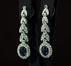 Комплект у покрытии родием з синими та белыми фианитами: колье, браслет, серьги 2 пари Комплект у покрытии родием з синими та белыми фианитами: колье, браслет, серьги 2 пари