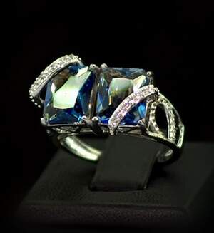 Срібна каблучка 925 проби 5,65 г з містичними Топазами та цирконами 10,9 карат Срібна каблучка 925 проби 5,65 г з містичними Топазами та цирконами 10,9 карат