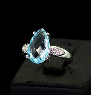 Серебряное кольцо 925 пробы 4,05 г с голубым Топазом и цирконами 5,19 карат