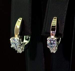 Серебряные серьги 925 пробы с позолотой 375 пробы 3,56 г с белыми Фианитами 1,5 карат Серебряные серьги 925 пробы с позолотой 375 пробы 3,56 г с белыми Фианитами 1,5 карат