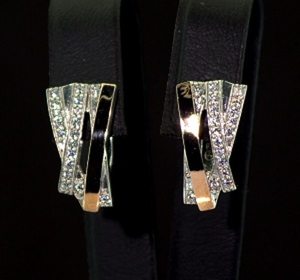 Серебряные серьги 925 пробы с позолотой 375 пробы 4,36 г с белыми Фианитами 0,65 карат Серебряные серьги 925 пробы с позолотой 375 пробы 4,36 г с белыми Фианитами 0,65 карат
