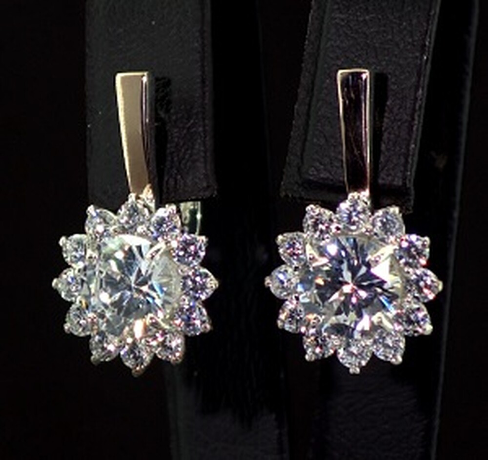 Серебряные серьги 925 пробы с позолотой 375 пробы 8,95 г с белыми Фианитами 10 карат Серебряные серьги 925 пробы с позолотой 375 пробы 8,95 г с белыми Фианитами 10 карат