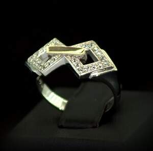 Серебряное кольцо 925 пробы с позолотой 375 пробы 3,47 г с белыми Фианитами 0,45 карат Серебряное кольцо 925 пробы с позолотой 375 пробы 3,47 г с белыми Фианитами 0,45 карат