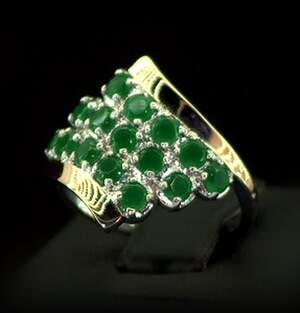 Серебряное кольцо 925 пробы с позолотой 375 пробы 4,14 г с зелеными Фианитами 2,95 карат