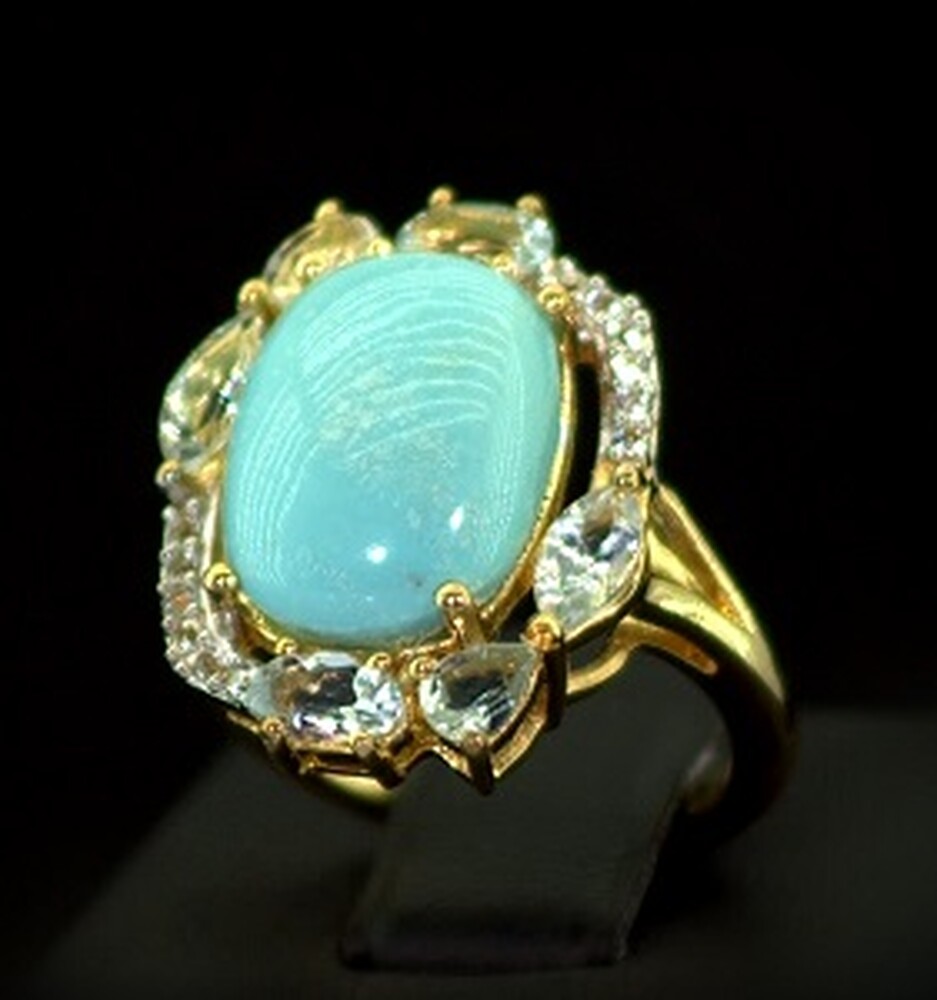 Серебряное кольцо 925 пробы 5,11 гр. с доминиканским Ларимаром, швейцарскими Топазами и топазами из США 8,5 карат Серебряное кольцо 925 пробы 5,11 гр. с доминиканским Ларимаром, швейцарскими Топазами и топазами из США 8,5 карат