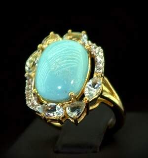 Серебряное кольцо 925 пробы 5,11 гр. с доминиканским Ларимаром, швейцарскими Топазами и топазами из США 8,5 карат Серебряное кольцо 925 пробы 5,11 гр. с доминиканским Ларимаром, швейцарскими Топазами и топазами из США 8,5 карат