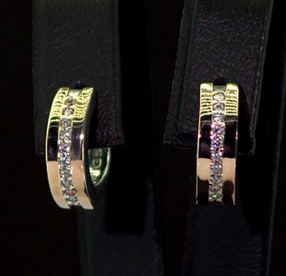 Срібні сережки 925 проби з позолотою 375 проби 3,83 г з білими Фіанітами 0,35 карат Срібні сережки 925 проби з позолотою 375 проби 3,83 г з білими Фіанітами 0,35 карат