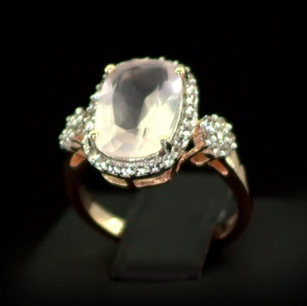 Срібна каблучка 925 проби в позолоті 750 проби 3,7 г з рожевим Кварцем зі США та топазами зі США 3,77 карат Срібна каблучка 925 проби в позолоті 750 проби 3,7 г з рожевим Кварцем зі США та топазами зі США 3,77 карат