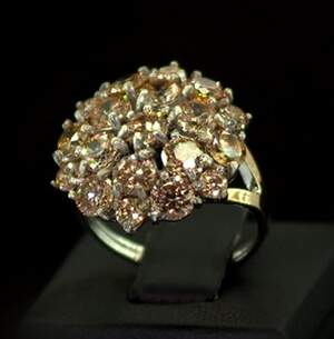 Серебряное кольцо 925 пробы с позолотой 375 пробы 5,93 г с желтыми Фианитами 8,95 карат