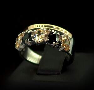 Серебряное кольцо 925 пробы с позолотой 375 пробы 5,41 г с желтыми та черными Фианитами 3,4 карат