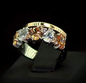 Серебряное кольцо 925 пробы с позолотой 375 пробы 5,12 г с желтыми та белыми Фианитами 3,4 карат