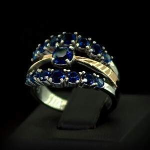 Серебряное кольцо 925 пробы с позолотой 375 пробы 4,88 г с синими Фианитами 3,45 карат