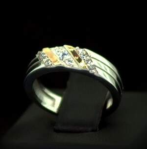 Срібна каблучка 925 проби з позолотою 375 проби 3,15 г з білими Фіанітами 0,25 карат Срібна каблучка 925 проби з позолотою 375 проби 3,15 г з білими Фіанітами 0,25 карат