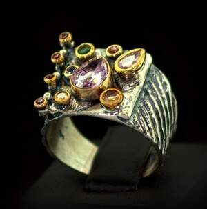 Срібна каблучка ручної роботи 925 проби 9,2 г з кольоровими цирконами 1,44 карат Срібна каблучка ручної роботи 925 проби 9,2 г з кольоровими цирконами 1,44 карат